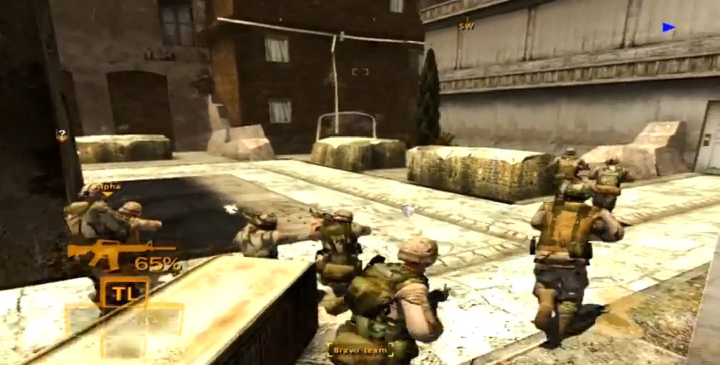Screen shot from Full Spectrum Warrior, showing soldiers moving through a run-down urban area