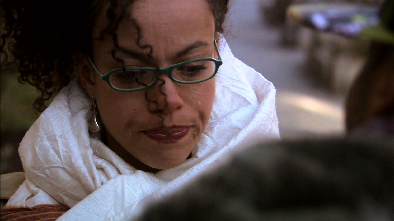 Hollis (Phyllis Johnson) struggles to reject her brother Drew's request one final time.