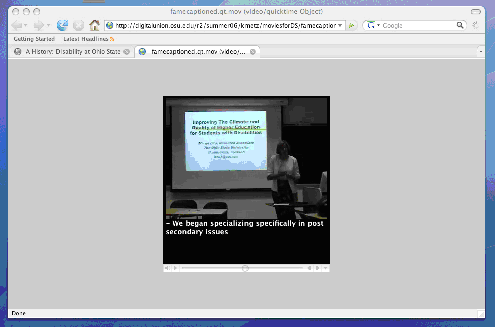screenshot of frame captioned movie playing in macintosh firefox browser