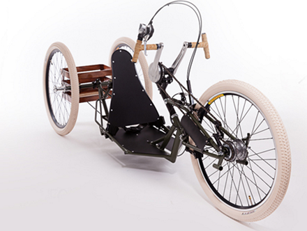 Photo of a handcycle. More description below.