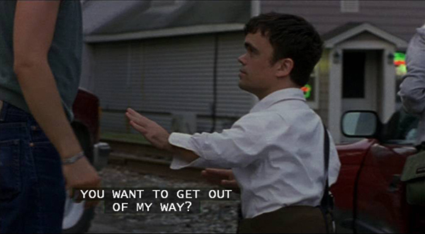 photo with closed caption of Chris asking Fin, You want to get out of my way? in a close-up shot from Fin's height