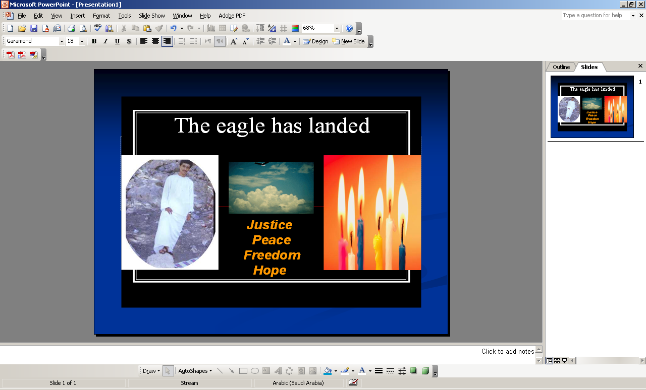 screenshot of powerpoint design view of slide with 3 graphics: a photo of a man in a white thawb and sandals standing on a rock, a smaller photo of a cloud in a blue sky, and a photo of three birthday cake candles, captioned 'The eagle has landed' and 'Justice Peace Freedom Hope'