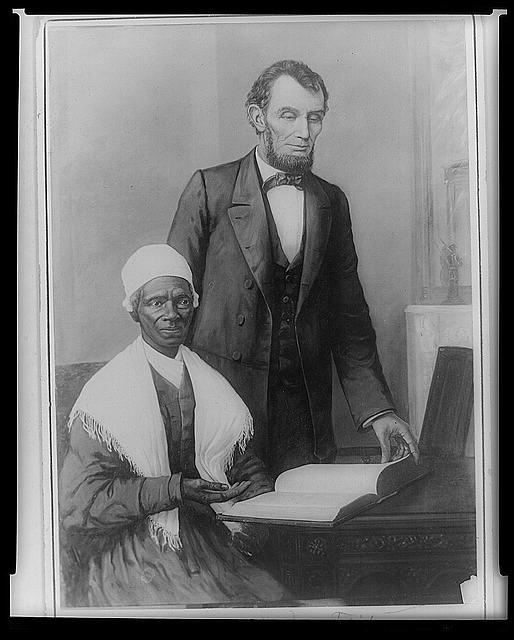 portrait of Abraham Lincoln standing near Sojourner Truth seated at a desk