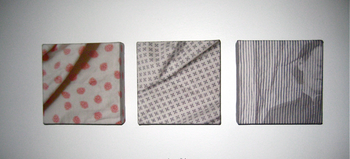 Image showing 3 images of hospital gown fabric, the first white with pink dots, the second white with a pattern composed of dark-colored x's, and the third blue and white striped with the semi-transparent image of a woman overlaid on the right side